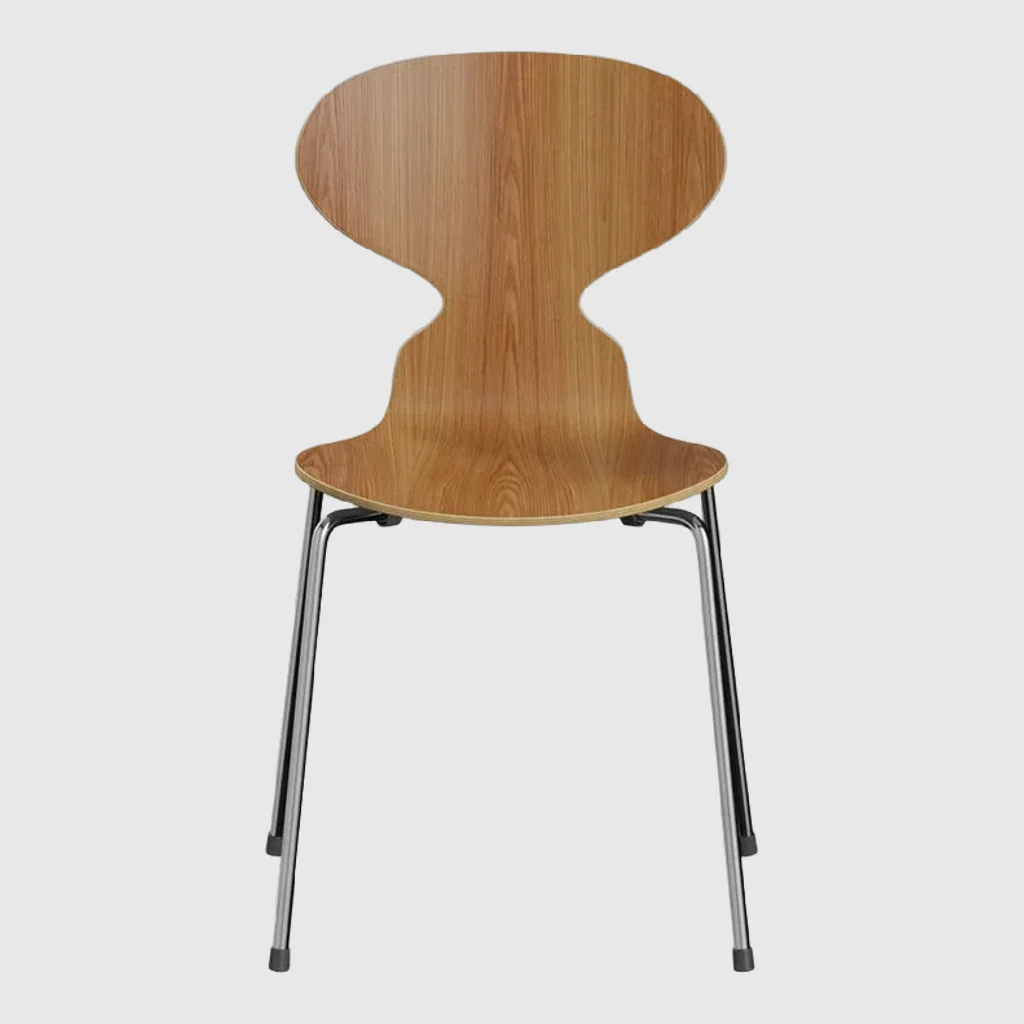 Moulded plywood chair photographed on a plain studio background